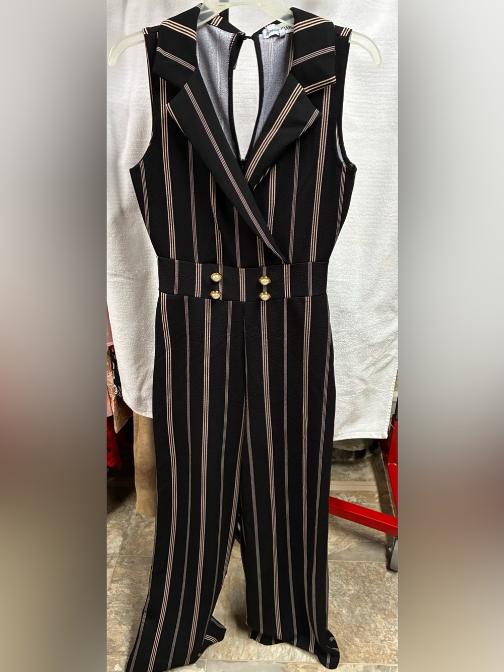 Sleeveless Black Pinstripe Jumpsuit with Pearl & Gold Buttons.